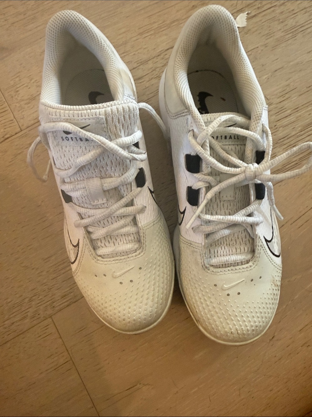 Nike White softball Sneakers with Black Swoosh